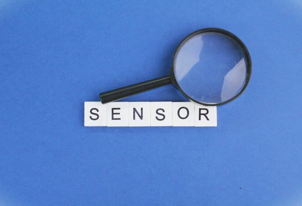 alphabet with the word sensor. the concept of sensor or device scanning.